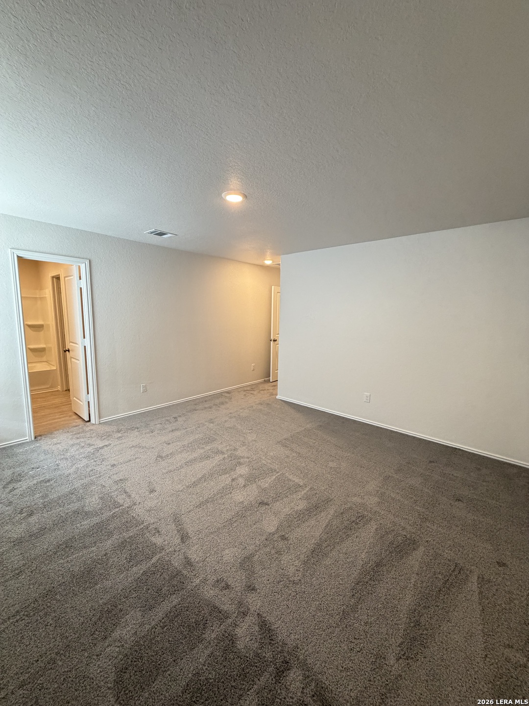 12914 Chinali St. Hedwig, TX 78152 - Photo 20 of 27 an empty room with an entryway