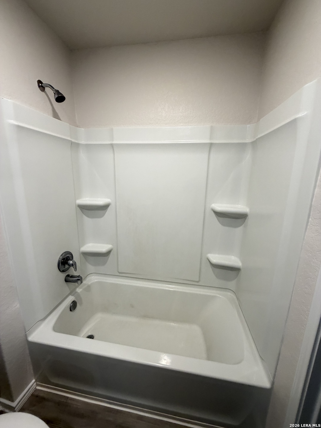 12914 Chinali St. Hedwig, TX 78152 - Photo 22 of 27 a bathroom with a bathtub