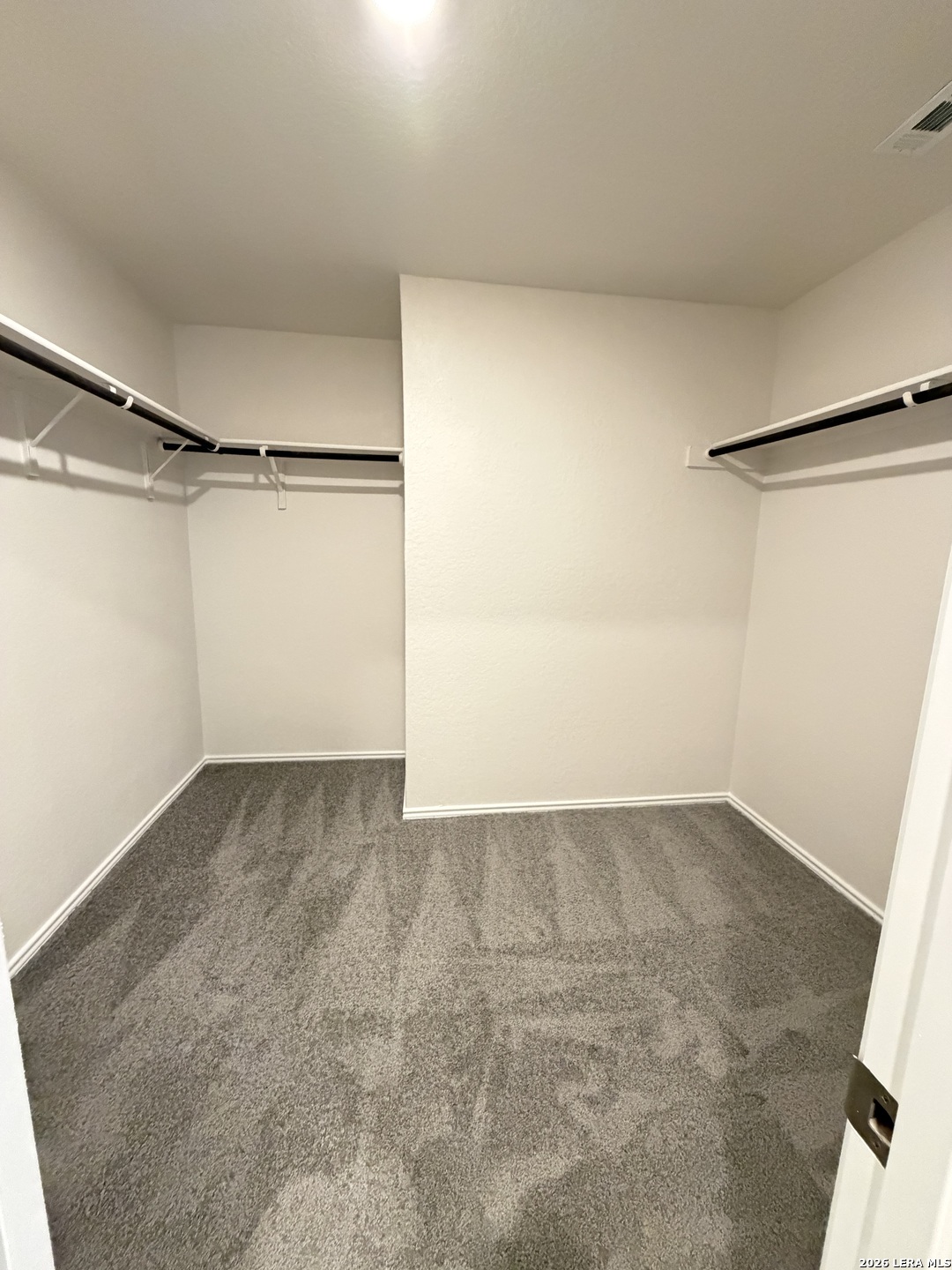 12914 Chinali St. Hedwig, TX 78152 - Photo 24 of 27 a view of a room with an empty shelf