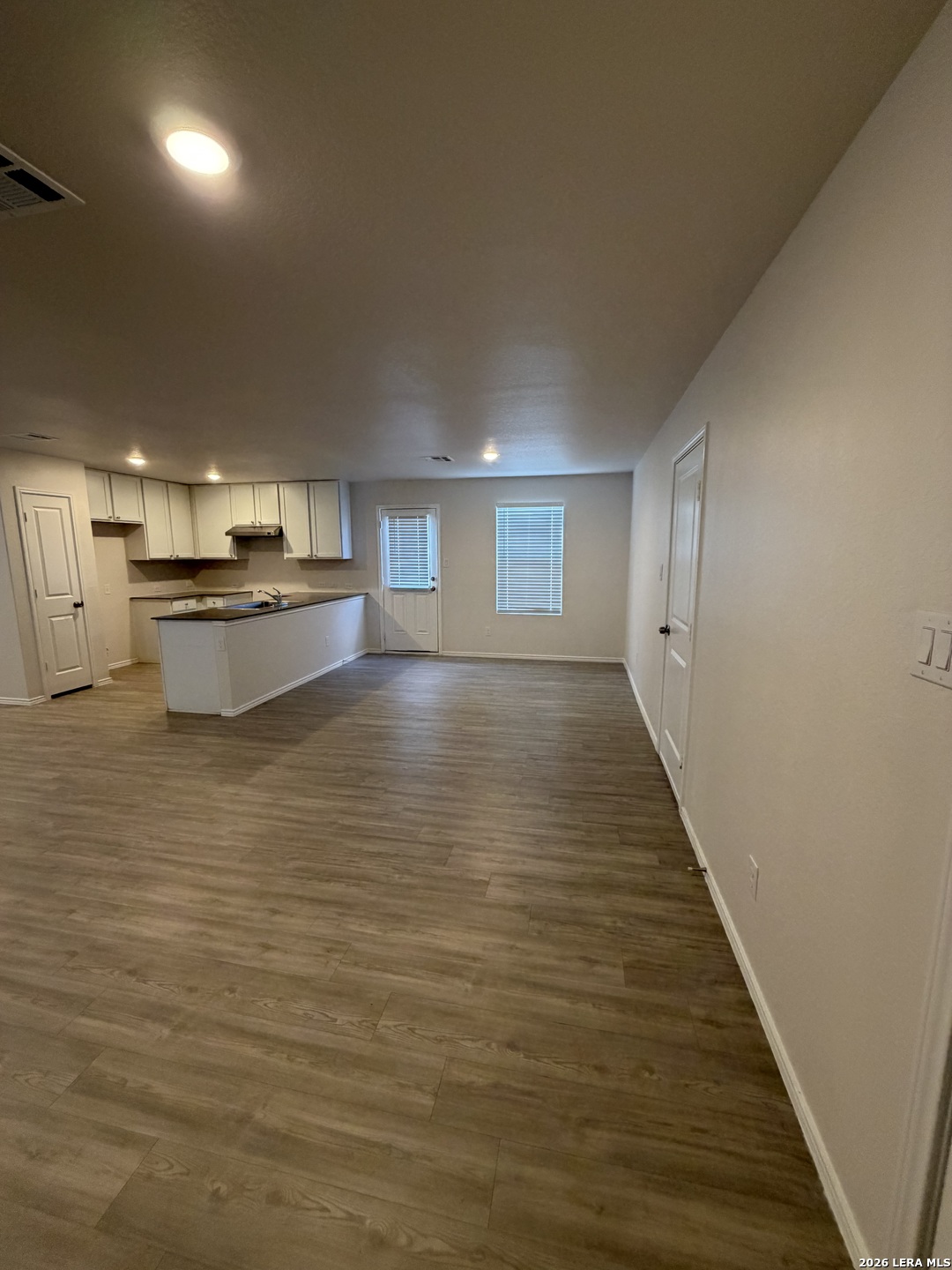 12914 Chinali St. Hedwig, TX 78152 - Photo 5 of 27 a large room with kitchen view