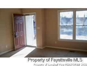 2283 Hackney Loop Fayetteville, NC 28304 - Photo 3 of 14 a hallway with a large window