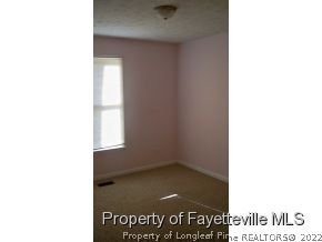 2283 Hackney Loop Fayetteville, NC 28304 - Photo 9 of 14 a view of an empty room