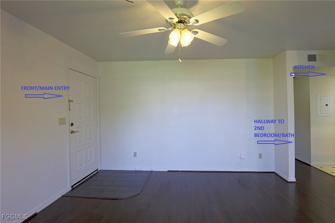 13220 Whitehaven Lane, Unit 1402 Fort Myers, FL 33966 - Photo 13 of 43 an empty room with a ceiling fan and a window
