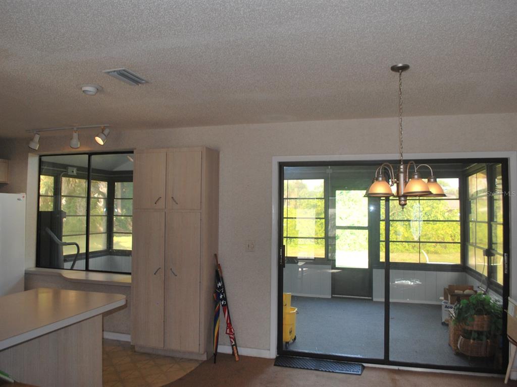 117 Poinciana Road Edgewater, FL 32141 - Photo 7 of 15 a view of an empty room with a window