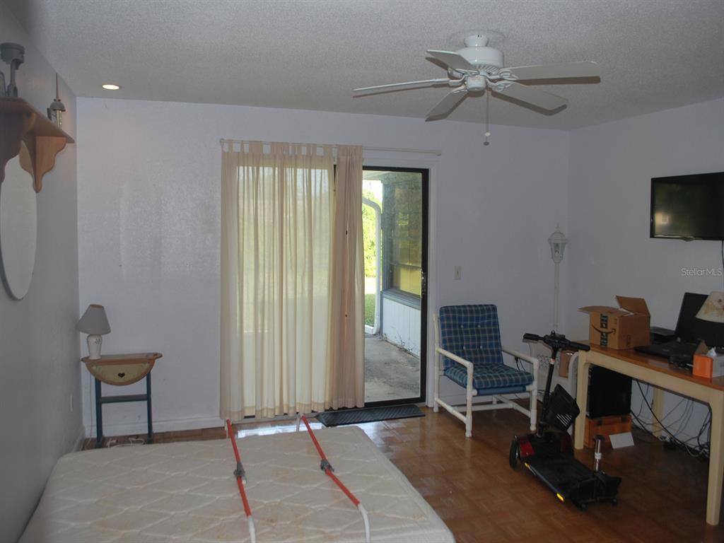 117 Poinciana Road Edgewater, FL 32141 - Photo 9 of 15 a workspace with furniture and window