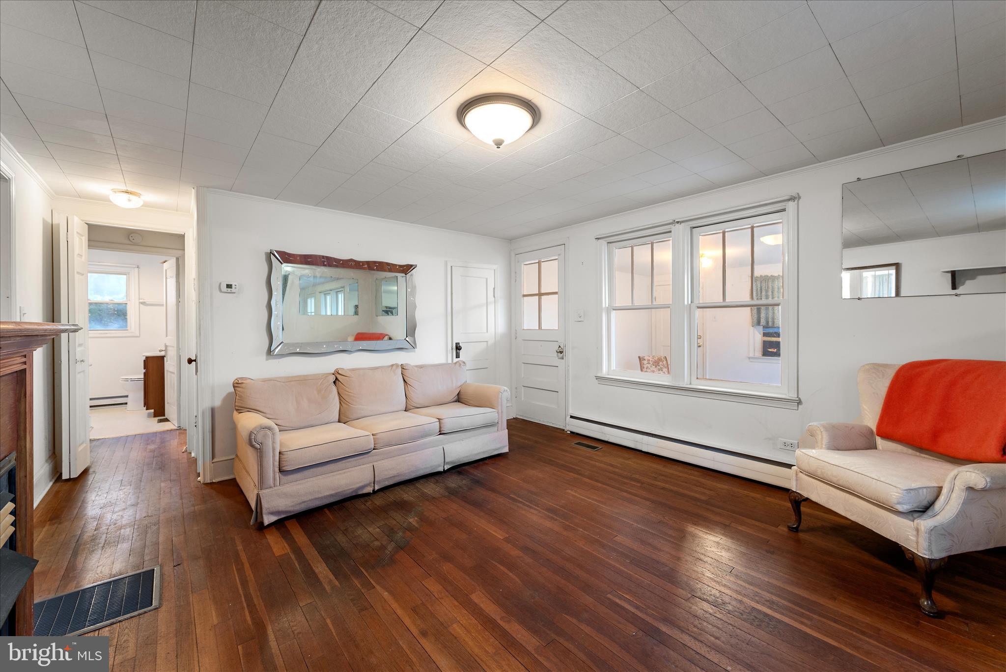 1621 Locke's Mill Road Berryville, VA 22611 - Photo 13 of 54 a living room with furniture and a flat screen tv