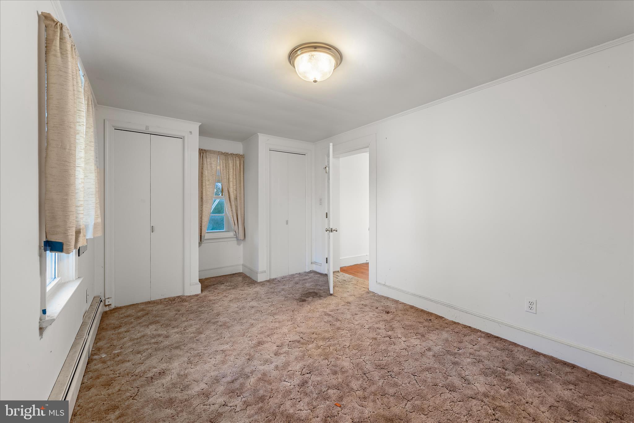 1621 Locke's Mill Road Berryville, VA 22611 - Photo 18 of 54 an empty room with a natural light