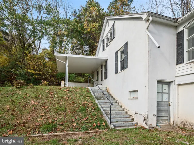 a bathroom with a sink a mirror and a bathtub