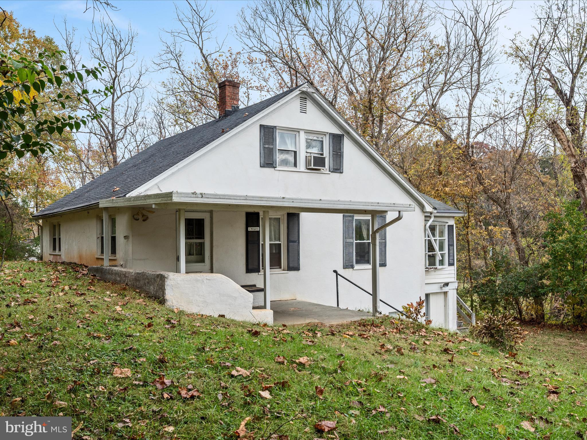 1621 Locke's Mill Road Berryville, VA 22611 - Photo 3 of 54 a front view of a house with a yard and large tree