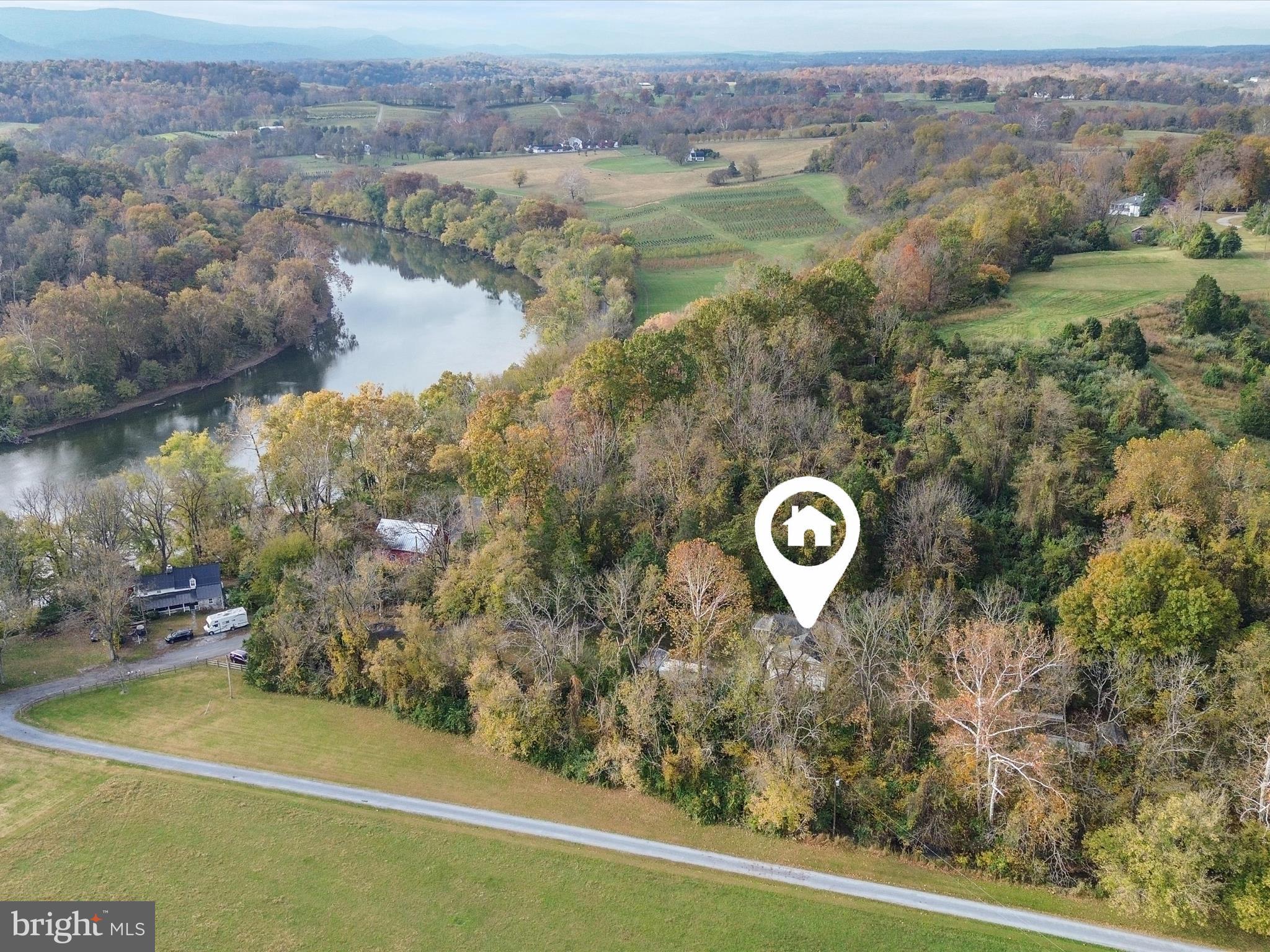1621 Locke's Mill Road Berryville, VA 22611 - Photo 47 of 54 a view of a lake with a mountain