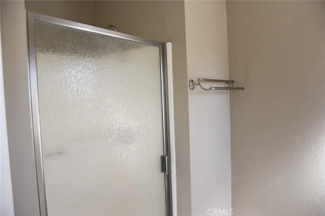 a view of a hallway with a white walls