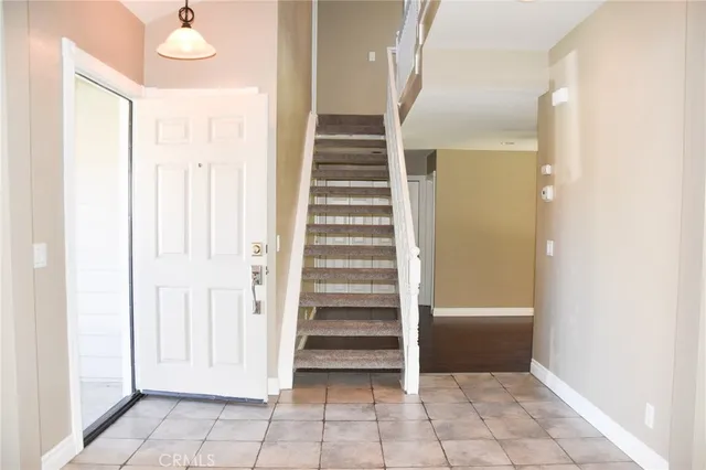 a view of a hallway view with staircase
