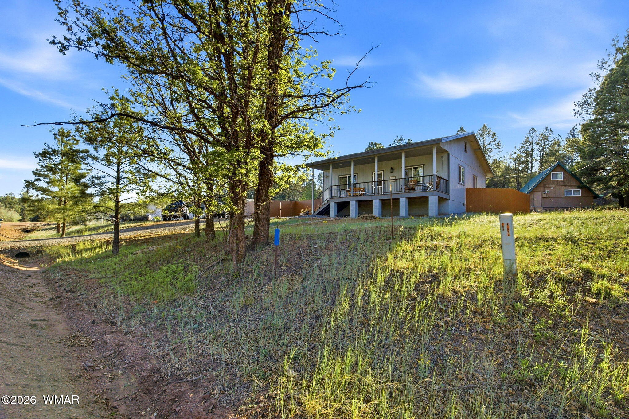 588 Rim Road Pinedale, AZ 85934 - Photo 4 of 30 a view of a house with a yard
