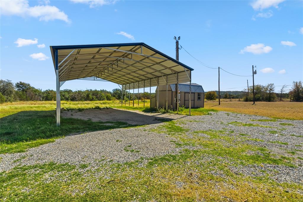 170 High Ridge Drive Azle, TX 76020 - Photo 34 of 36 a view of a house with a yard