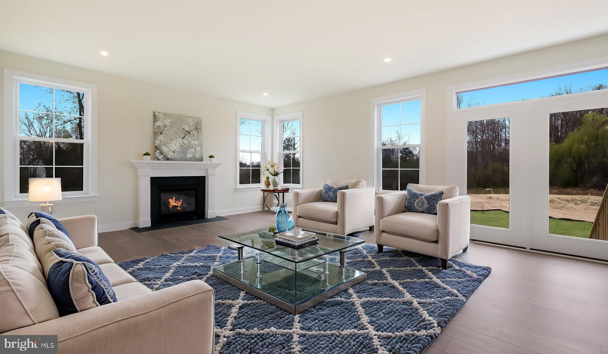 1205 Jordan Lane Perkasie, PA 18944 - Photo 8 of 40 a living room with furniture and a fireplace