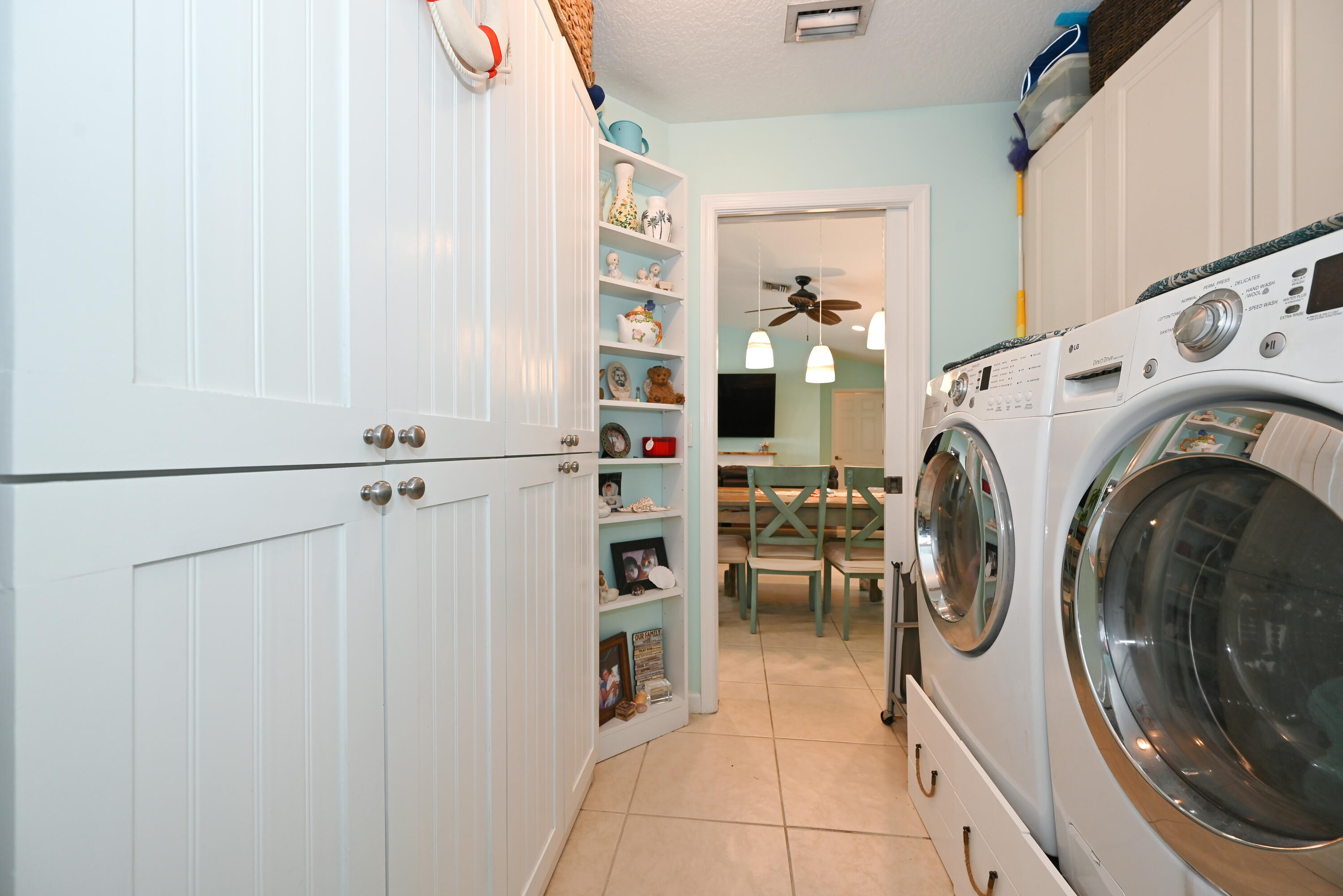 126 Faith Way Jupiter, FL 33458 - Photo 31 of 61 a view of kitchen and washer dryer