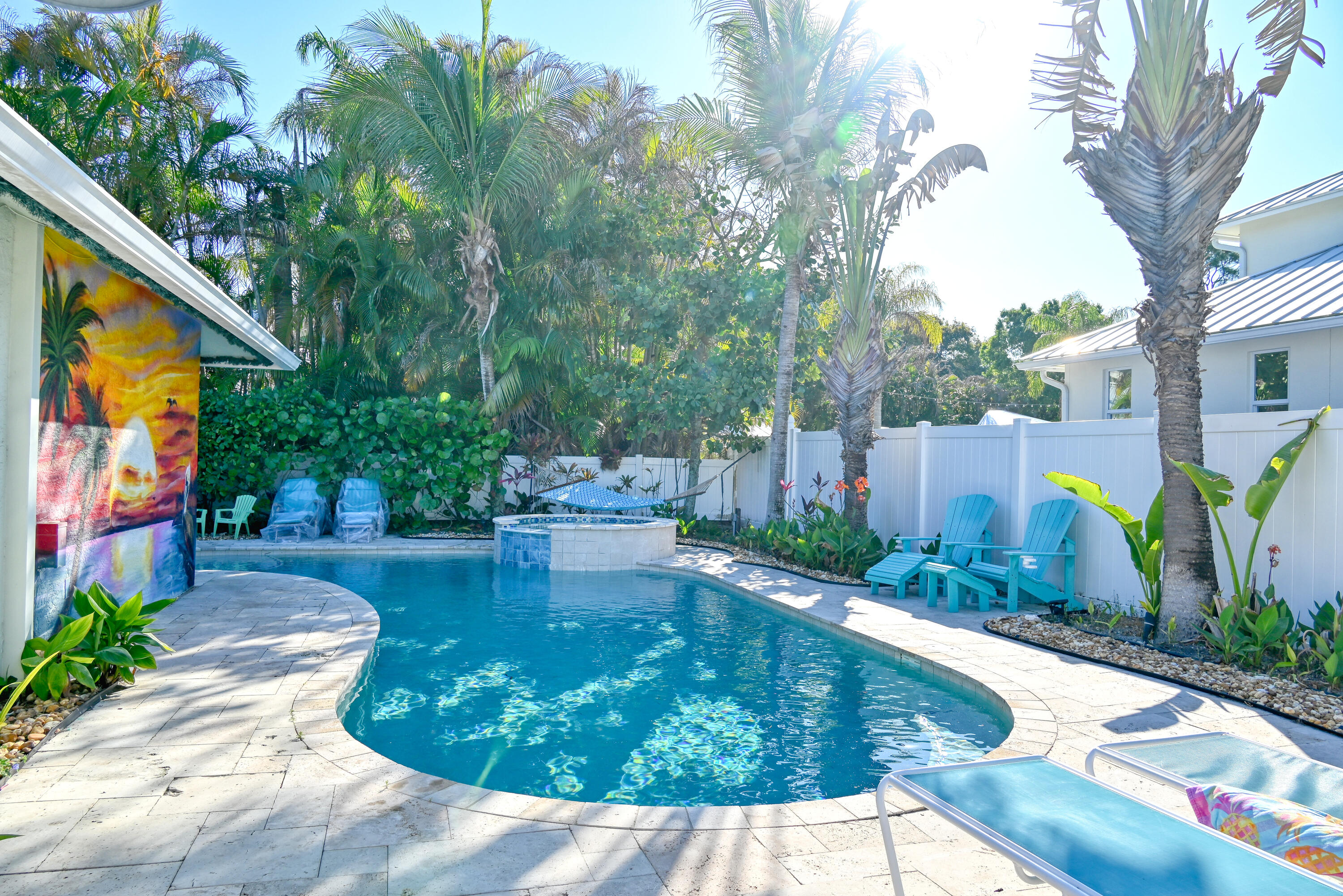 126 Faith Way Jupiter, FL 33458 - Photo 35 of 61 a view of a swimming pool with a patio