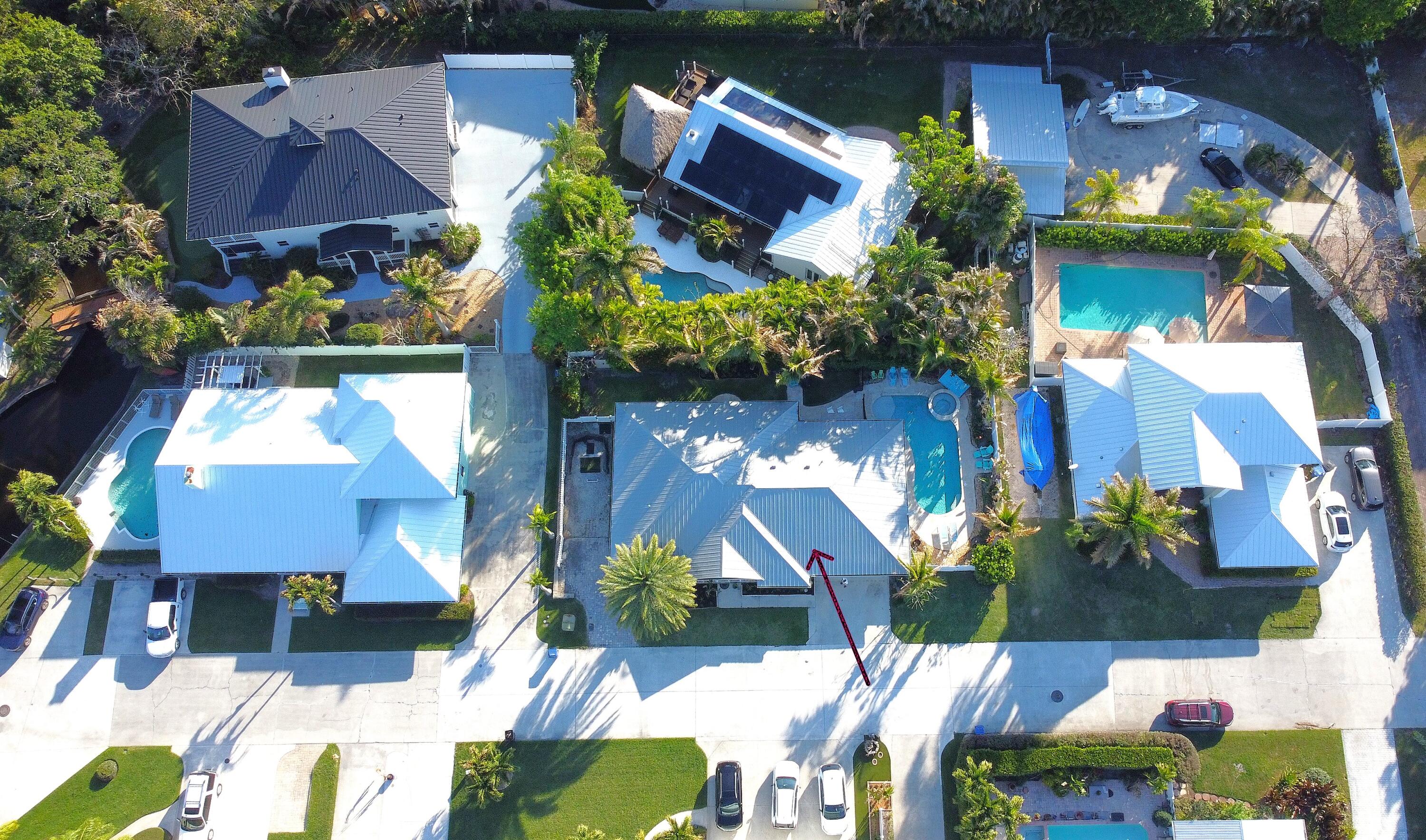 126 Faith Way Jupiter, FL 33458 - Photo 45 of 61 an aerial view of a house