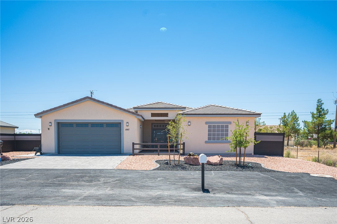 441 Belville Road Pahrump, NV 89048 - Photo 1 of 44 A desert oasis, this property combines modern design with drought-tolerant landscaping and expansive views.