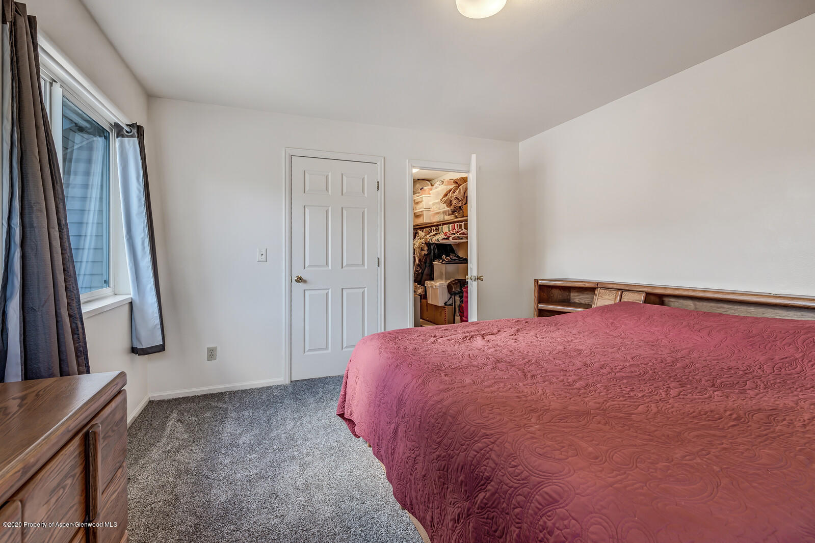 426 Lind Avenue Rifle, CO 81650 - Photo 11 of 20 a bed room with a bed and a window