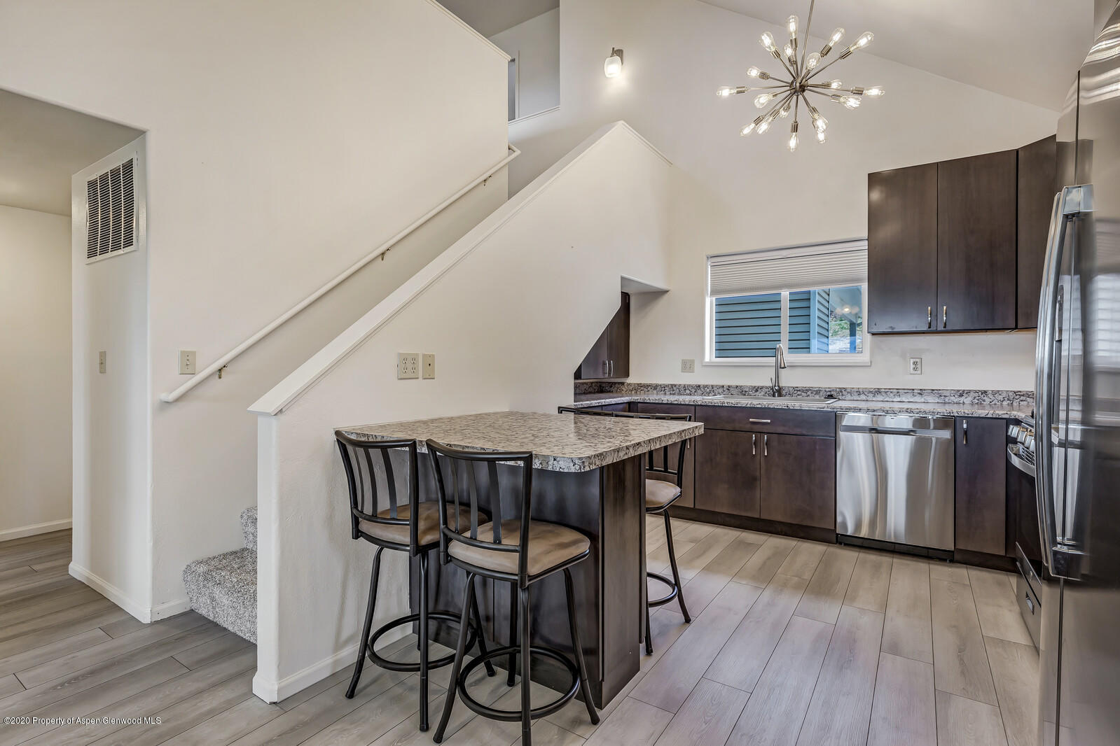 426 Lind Avenue Rifle, CO 81650 - Photo 2 of 20 a view of a dining room with furniture kitchen and wooden floor