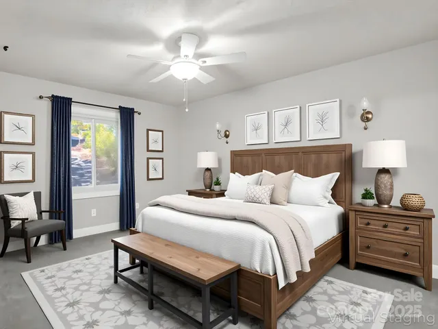 a spacious bedroom with a bed a couch and dresser