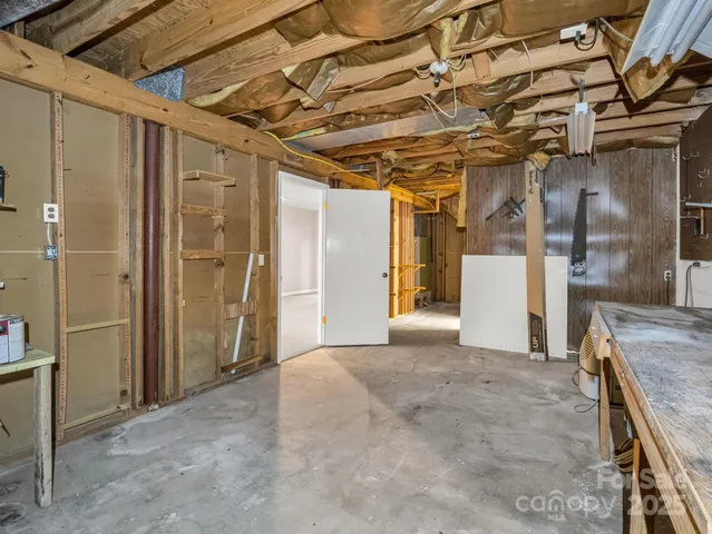 a view of a hallway with some shower