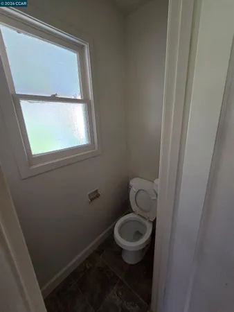 a bathroom with a toilet