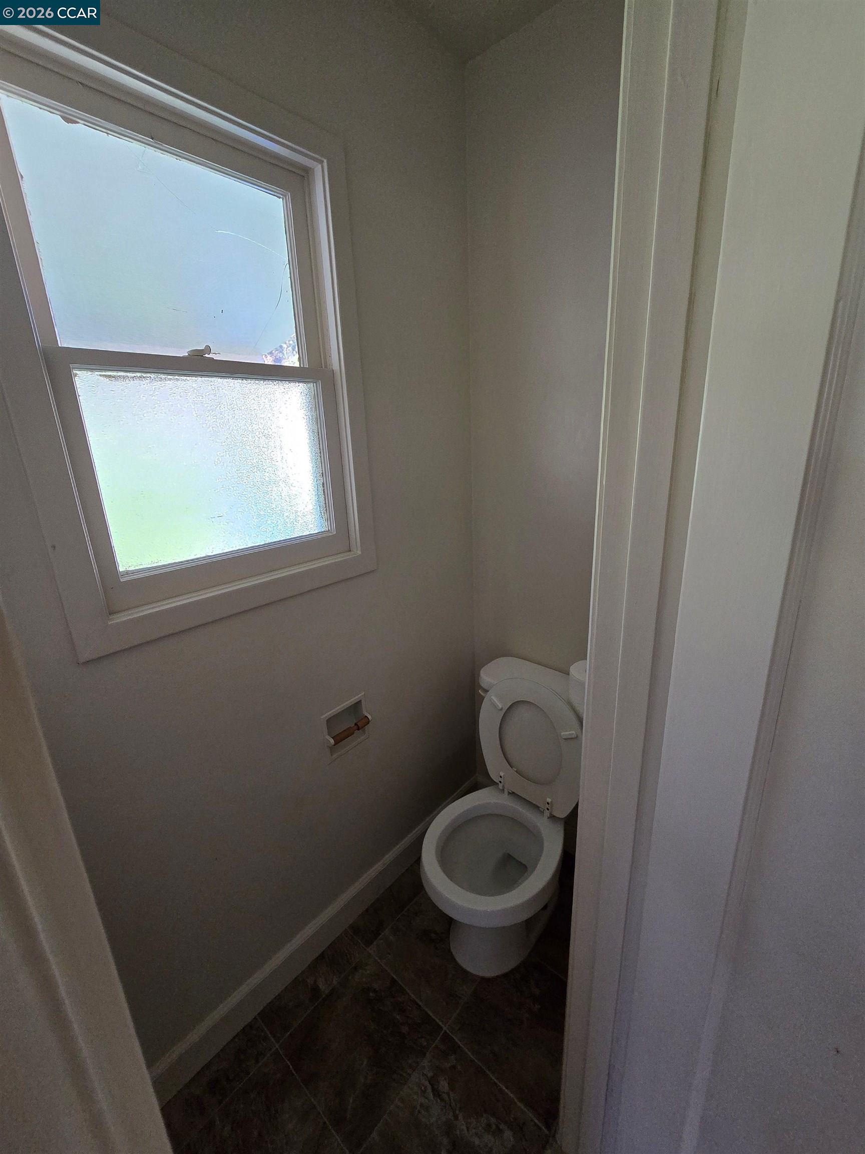 4455 Appian Way El Sobrante, CA 94803 - Photo 11 of 12 a bathroom with a toilet