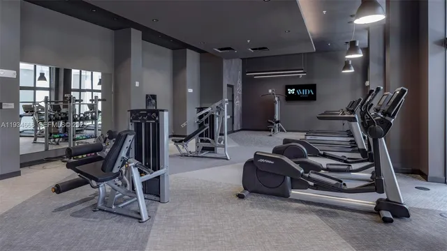 a view of a room with gym equipment