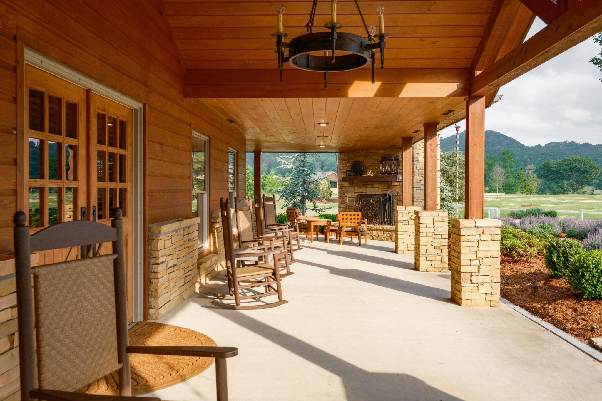 6971 West Cove Road Chickamauga, GA 30707 - Photo 64 of 100 a view of a patio with a table and chairs under an umbrella