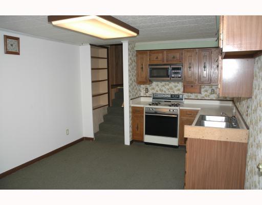 20 Fort Pitt Road Carnegie, PA 15106 - Photo 5 of 14 Kitchen. Beautiful cabints in our large eat-in kitchen with split-level stairs leading to a cozy family room, den or home office.