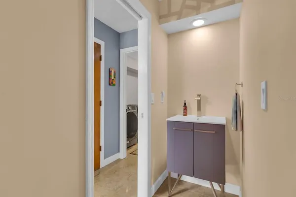 a bedroom with bed and window