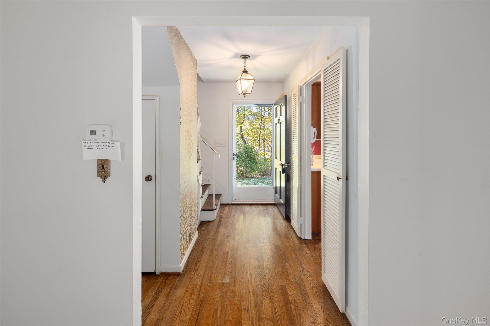 131 Allison Road Katonah, NY 10536 - Photo 15 of 28 a view of hallway with wooden floor