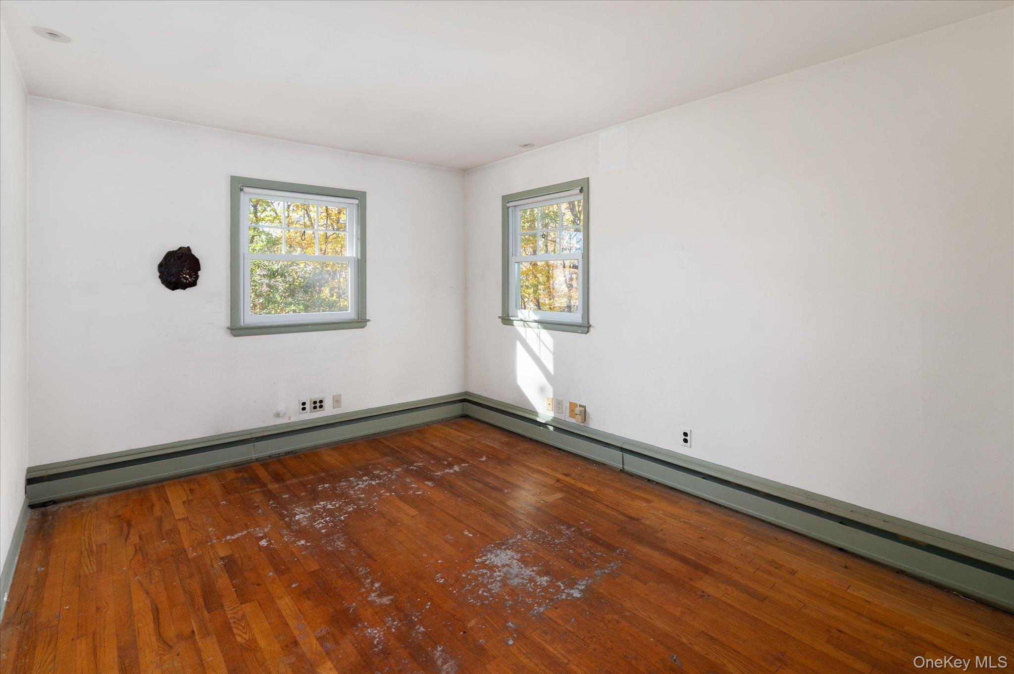 131 Allison Road Katonah, NY 10536 - Photo 17 of 28 a view of an empty room with a window