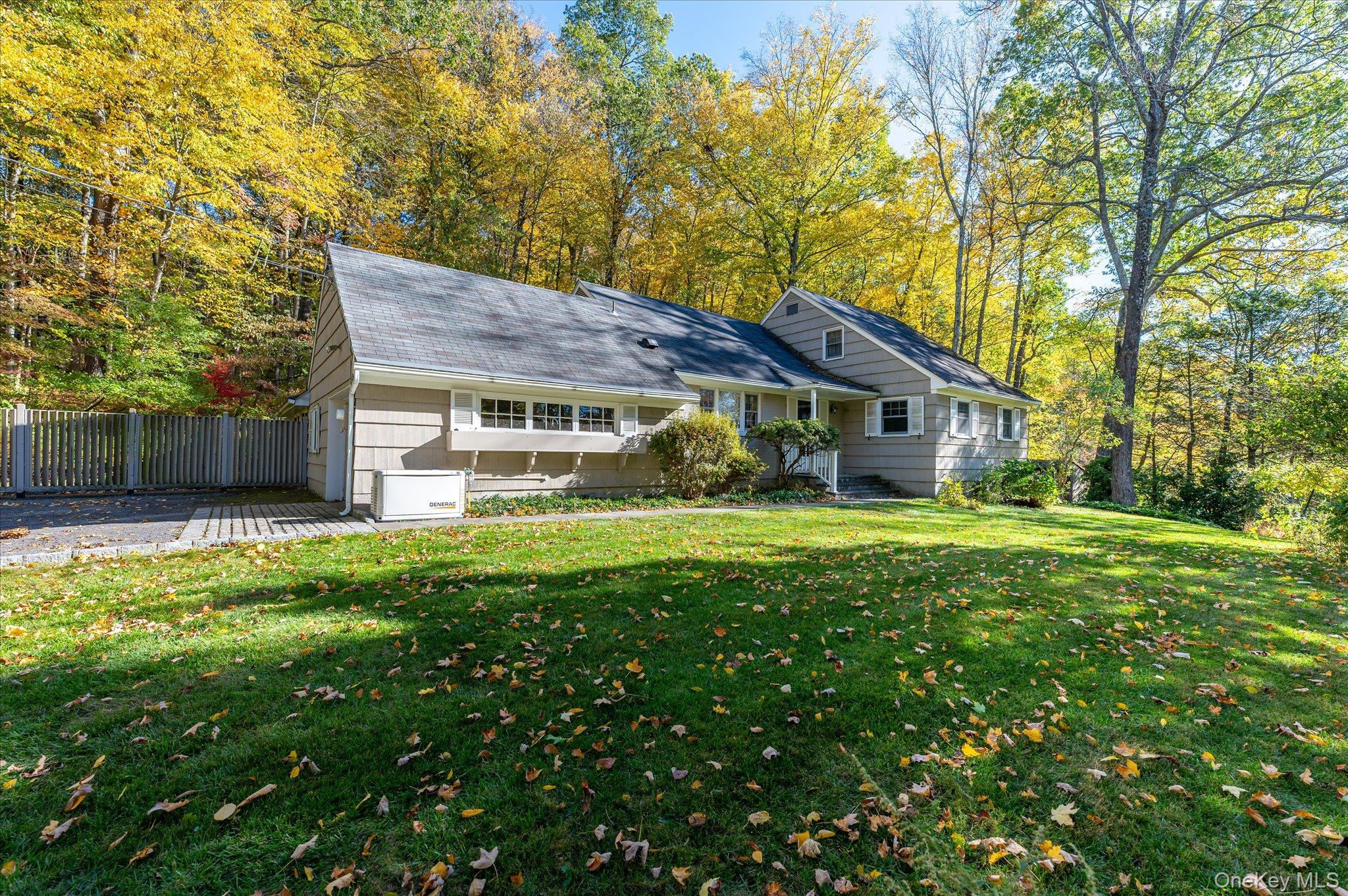 131 Allison Road Katonah, NY 10536 - Photo 2 of 28 a front view of a house with a yard