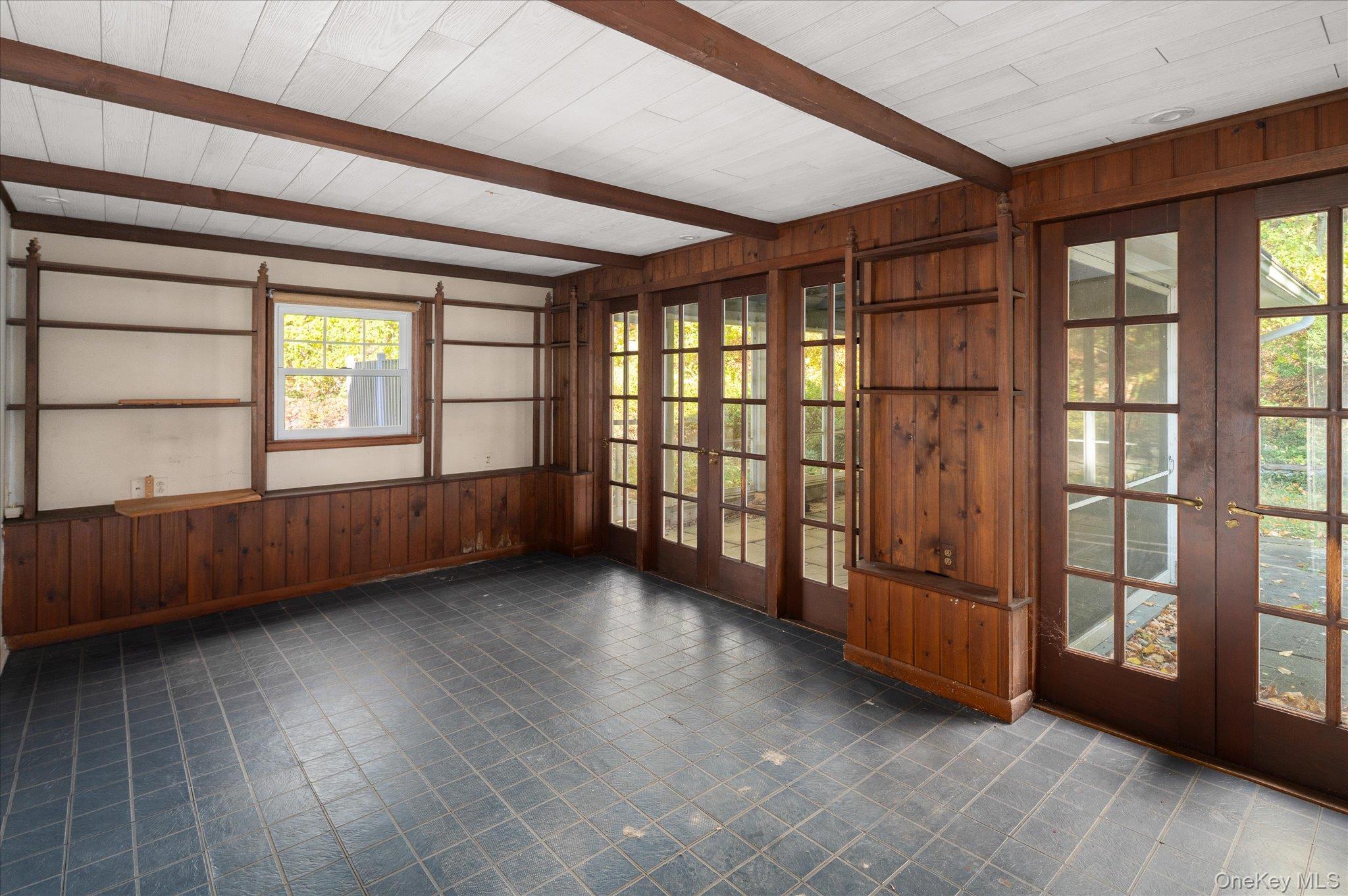 131 Allison Road Katonah, NY 10536 - Photo 24 of 28 an empty room with wooden floor and windows