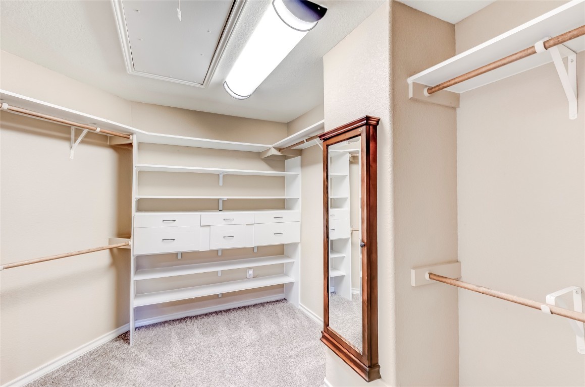 2310 McKendrick Drive Cedar Park, TX 78613 - Photo 20 of 32 a view of walk in closet with empty racks