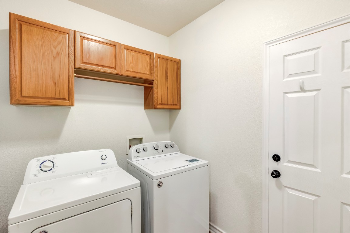 2310 McKendrick Drive Cedar Park, TX 78613 - Photo 27 of 32 a utility room with dryer and washer