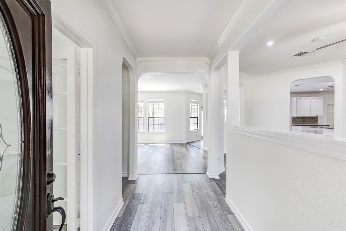 2310 McKendrick Drive Cedar Park, TX 78613 - Photo 6 of 32 a view of hallway with wooden floor