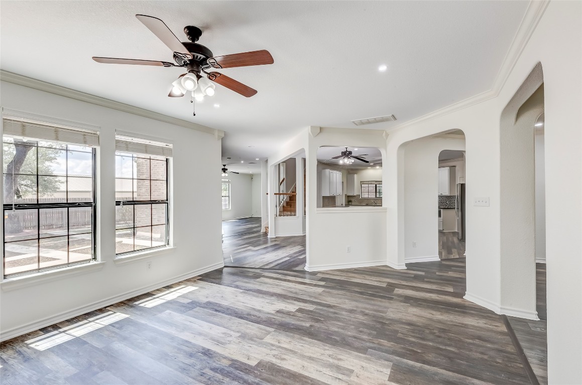 2310 McKendrick Drive Cedar Park, TX 78613 - Photo 9 of 32 a view of a livingroom with a ceiling fan and window