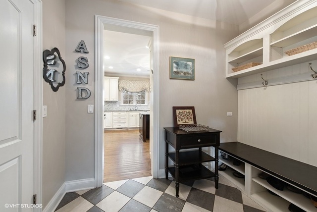 Undisclosed Address Deerfield, IL 60015 - Photo 14 of 34 a room with a table and a window