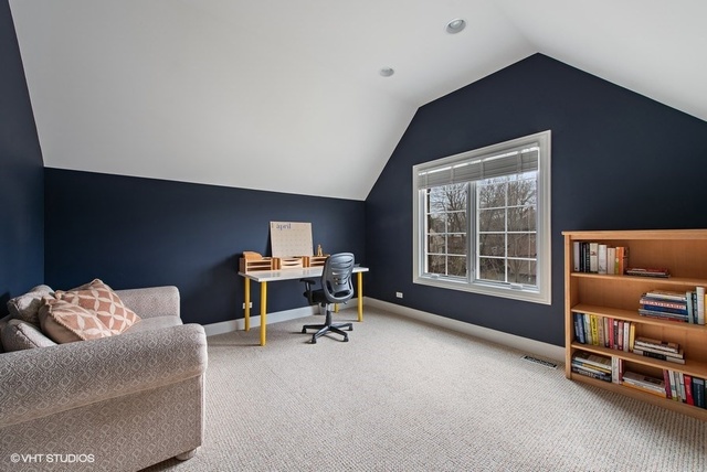 Undisclosed Address Deerfield, IL 60015 - Photo 18 of 34 a workspace with furniture and a window