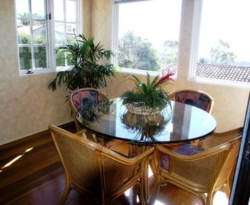 580 Las Alturas Road Santa Barbara, CA 93103 - Photo 3 of 15 a dining room with furniture and garden view