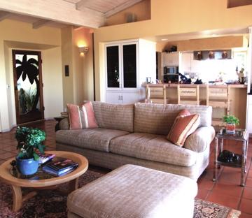 580 Las Alturas Road Santa Barbara, CA 93103 - Photo 8 of 15 a living room with furniture potted plant and a mirror