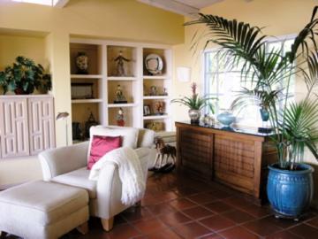 580 Las Alturas Road Santa Barbara, CA 93103 - Photo 9 of 15 a bedroom with a bed and a potted plant