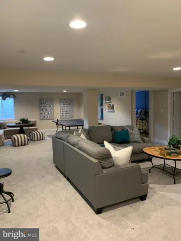 a bedroom with a bed furniture and a window