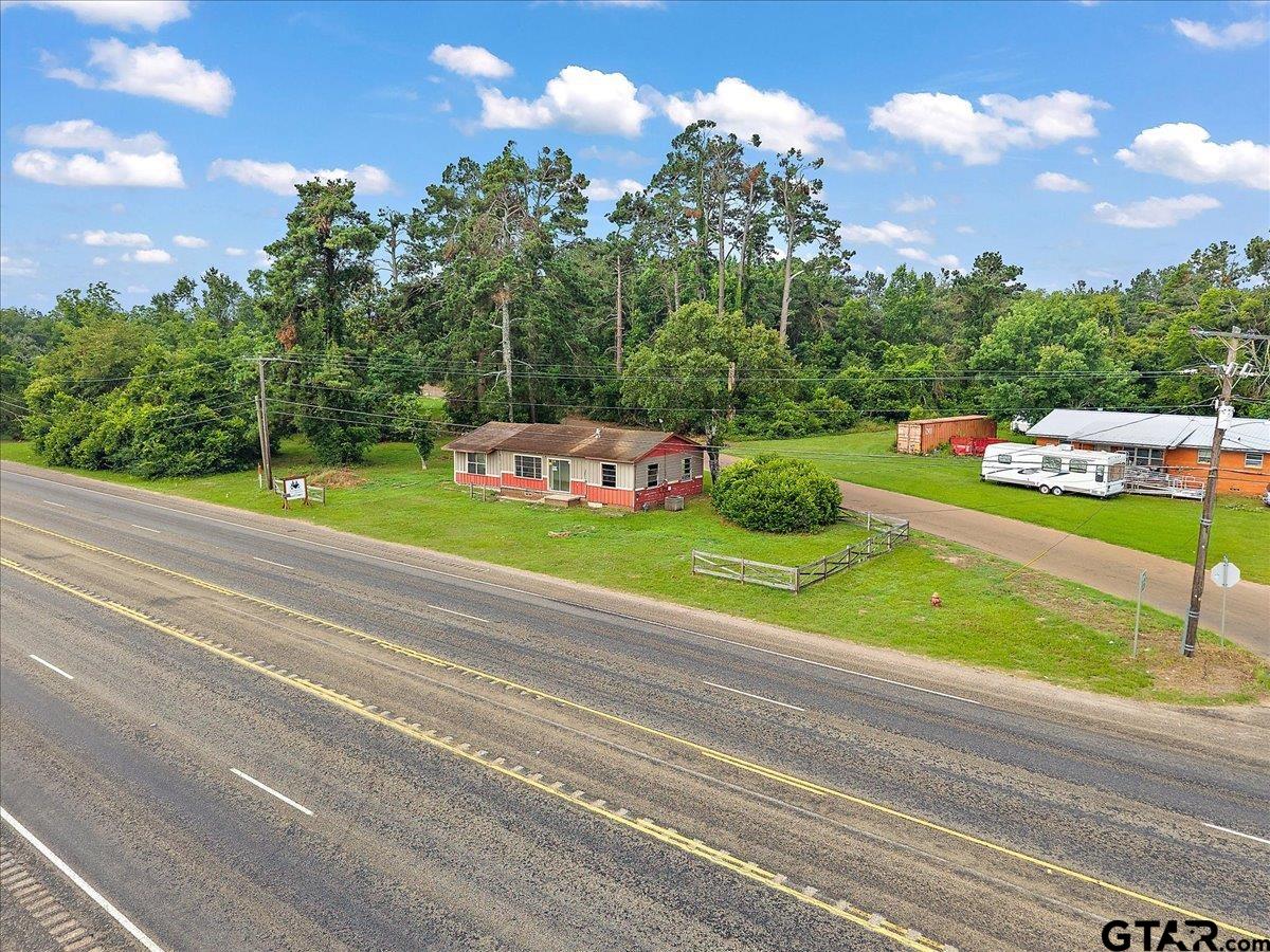 1535 North Dickinson Drive Rusk, TX 75785 - Photo 2 of 18 a view of a play ground with a house