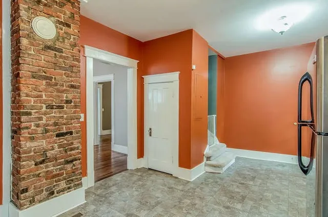 a view of a room with a door