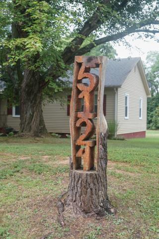 5124 Pineywoods Road Adams, TN 37010 - Photo 2 of 20 This is such a neat feature. This is the address carved into a rooted, standing tree trunk. You won't find this any where else; definitely ONE OF A KIND!